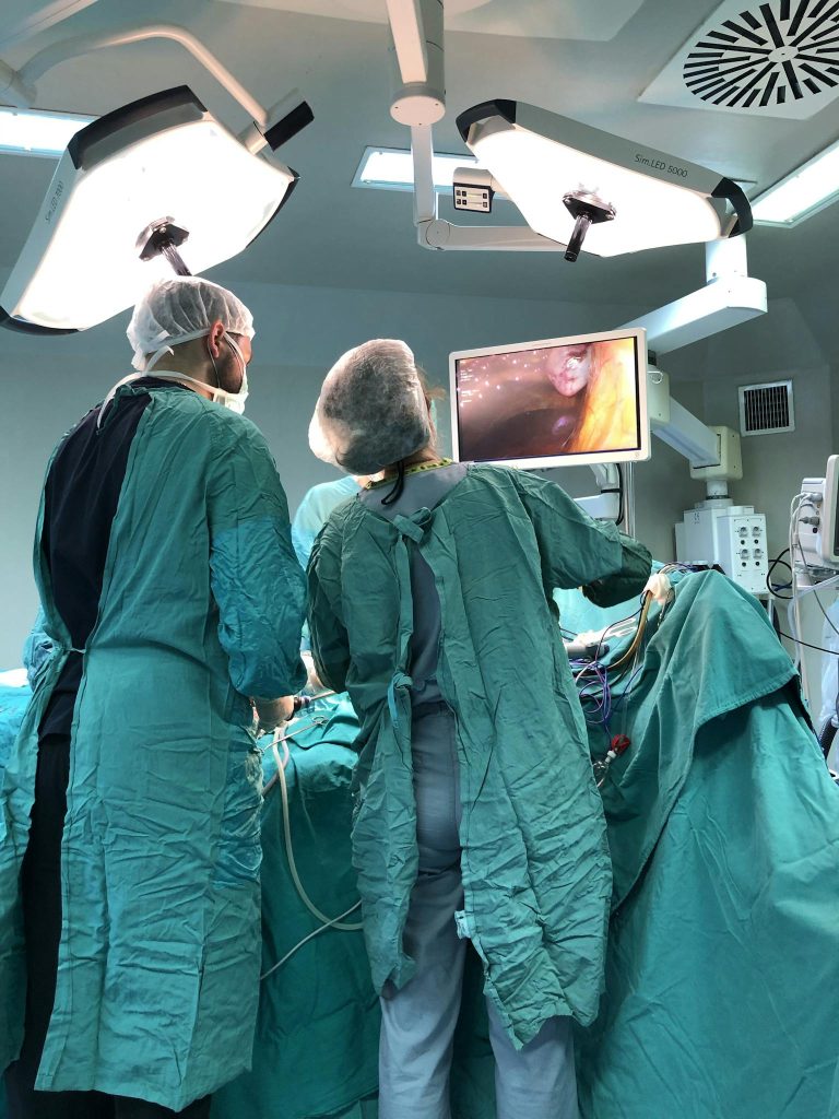 Doctors Performing a Surgery in an Operating Theatre